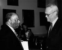 Dr. Thomson talking to a friend.